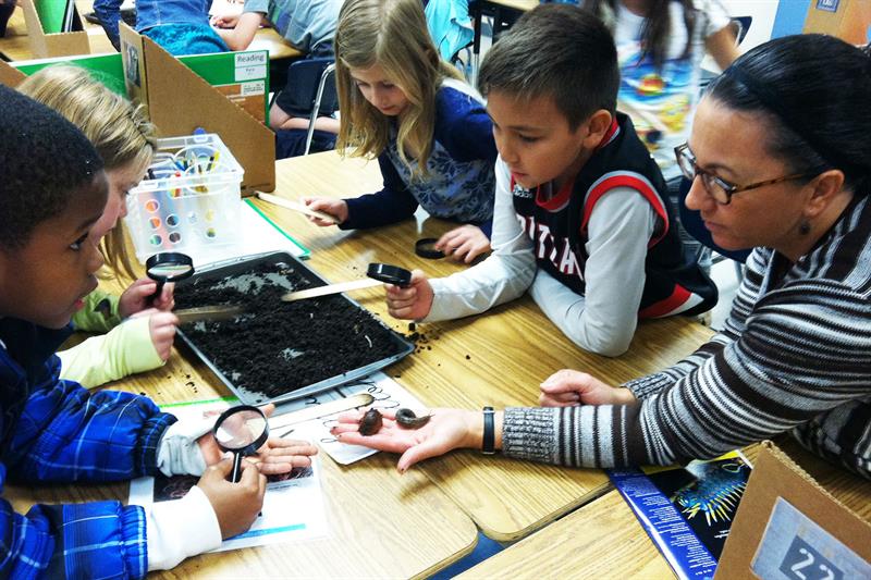 Kids Studying Snails