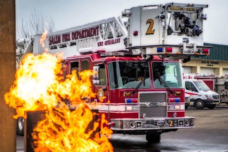 Salem Fire Department Ladder 2 truck arriving at a fire