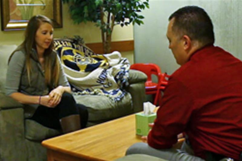 Woman talking with officer