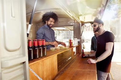 Food Truck Vendor Selling to Customers