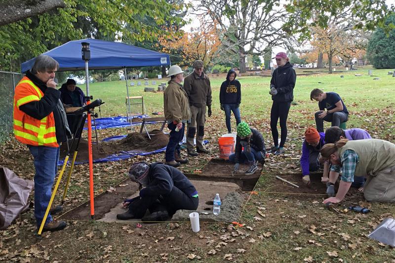 Willamette University students help excavate the Chinese Shrine in Salem Pioneer Cemetery