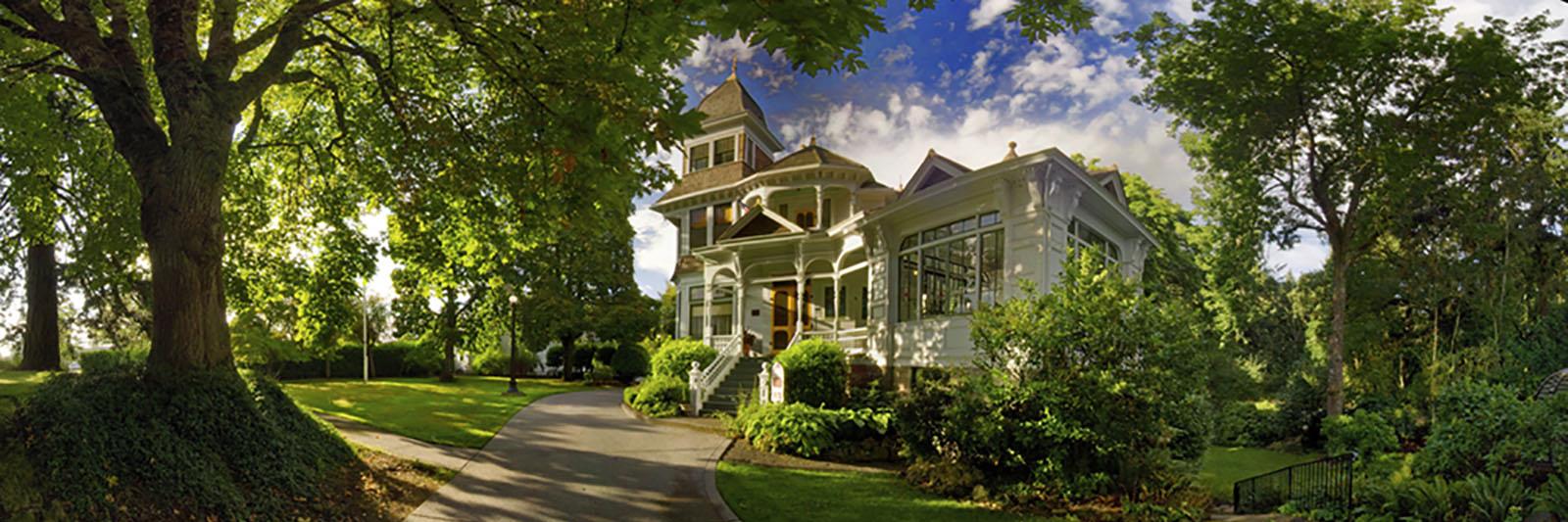 Deepwood estate house and shady path in garden