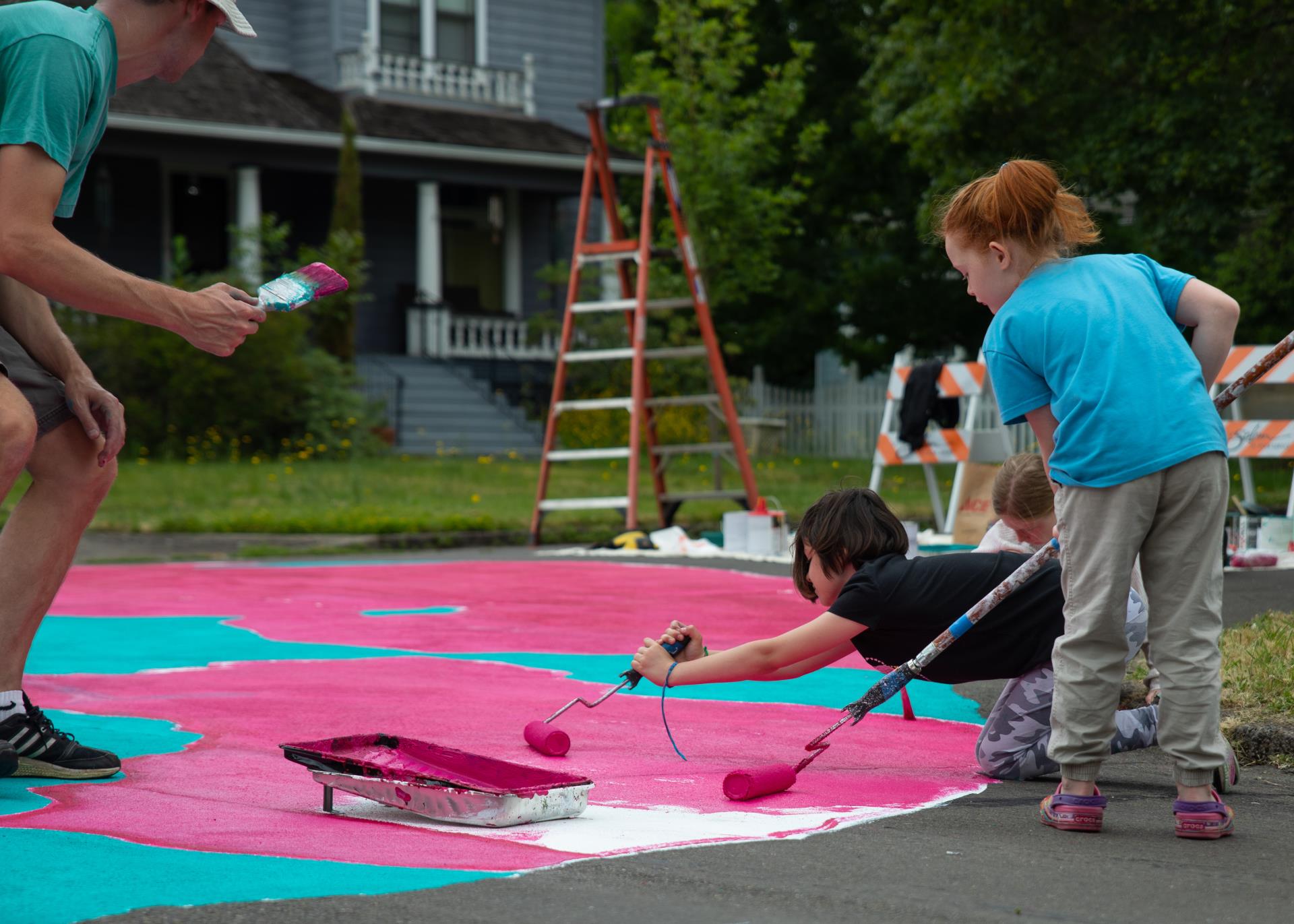 Bellmont and Cottage Street Painting Supplies Sign and painter