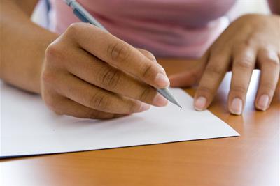 woman writing letter mechanical pencil