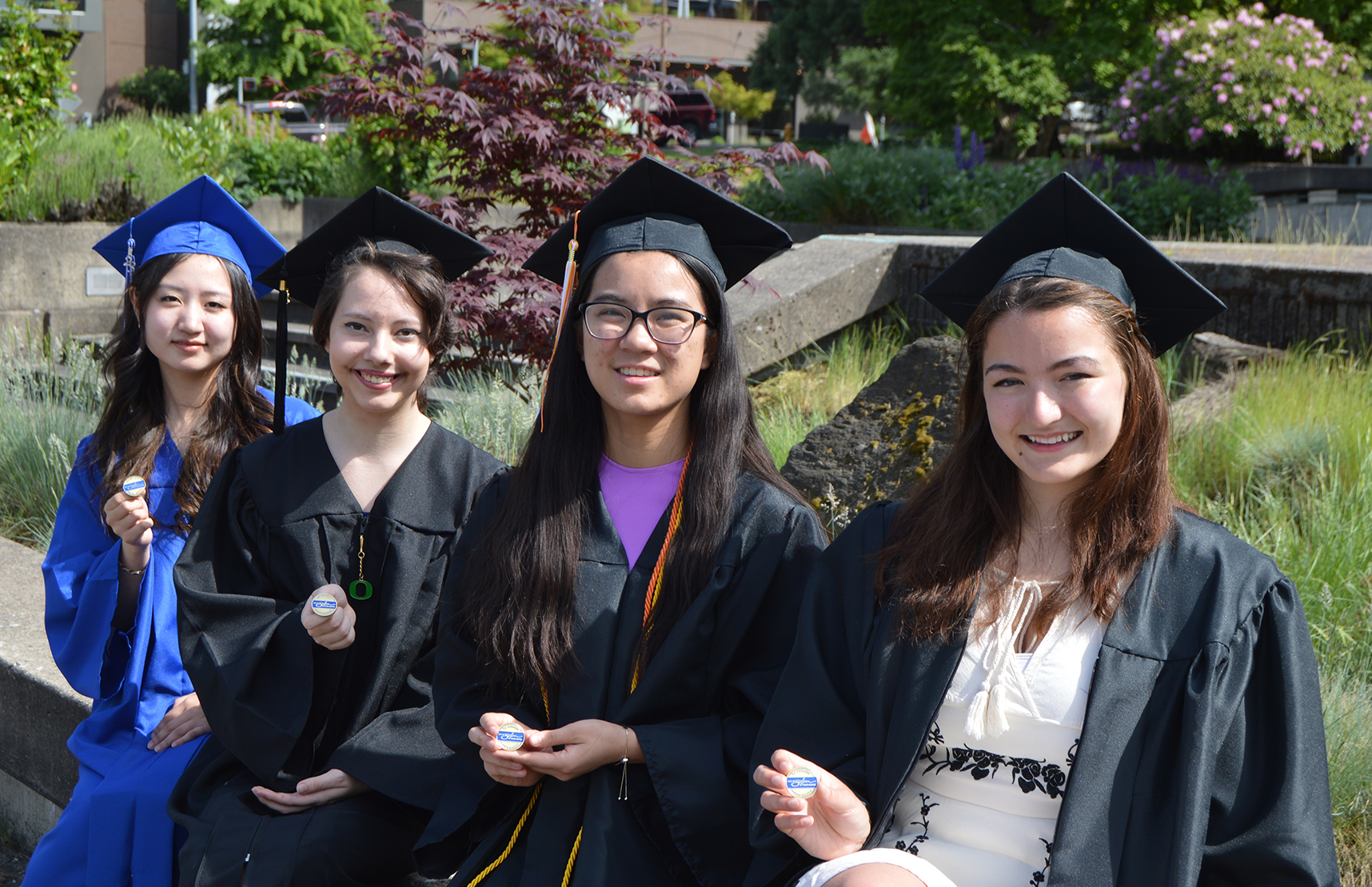 Four service honor grads with pins