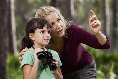 woman and child birdwatching